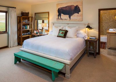 bedroom at the Shields River Residence designed by Elizabeth Robb Interiors