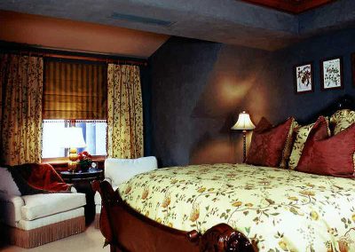 bedroom at the Aspen Ranch designed by Elizabeth Robb Interiors