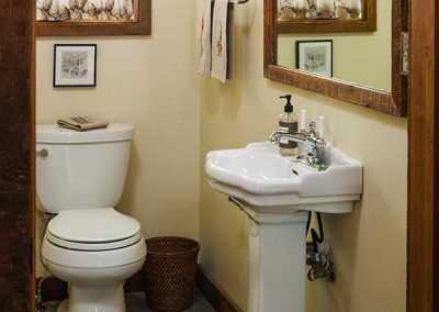 powder room at the Shields River Residence designed by Elizabeth Robb Interiors