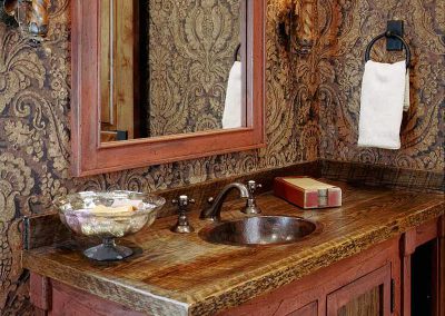 powder room at the Spanish Peaks Residence designed by Elizabeth Robb Interiors