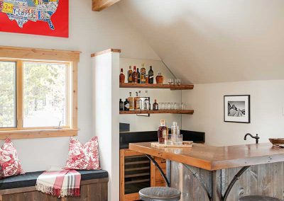 liquor bar in den of Moonlight residence designed by Elizabeth Robb Interiors