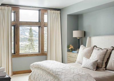 white and gray bedroom of Moonlight residence designed by Elizabeth Robb Interiors